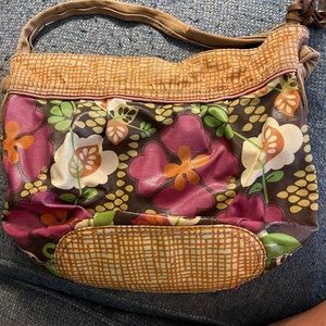 Fossil purse with wear